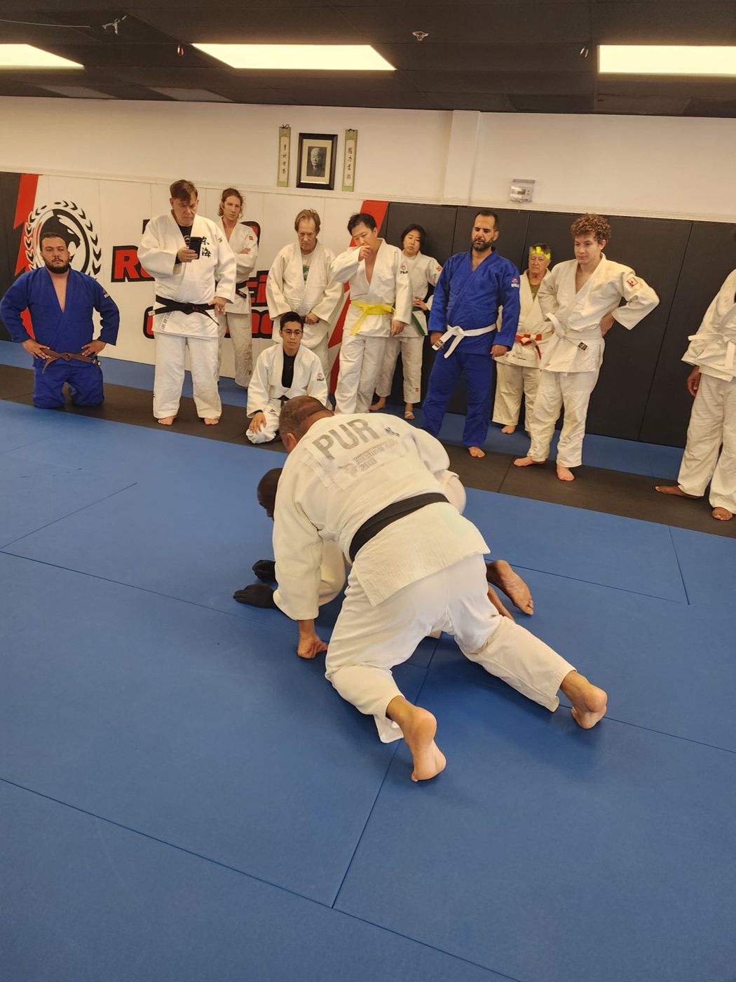 Judo groundwork at a tournament with Winter Haven athletes in gis