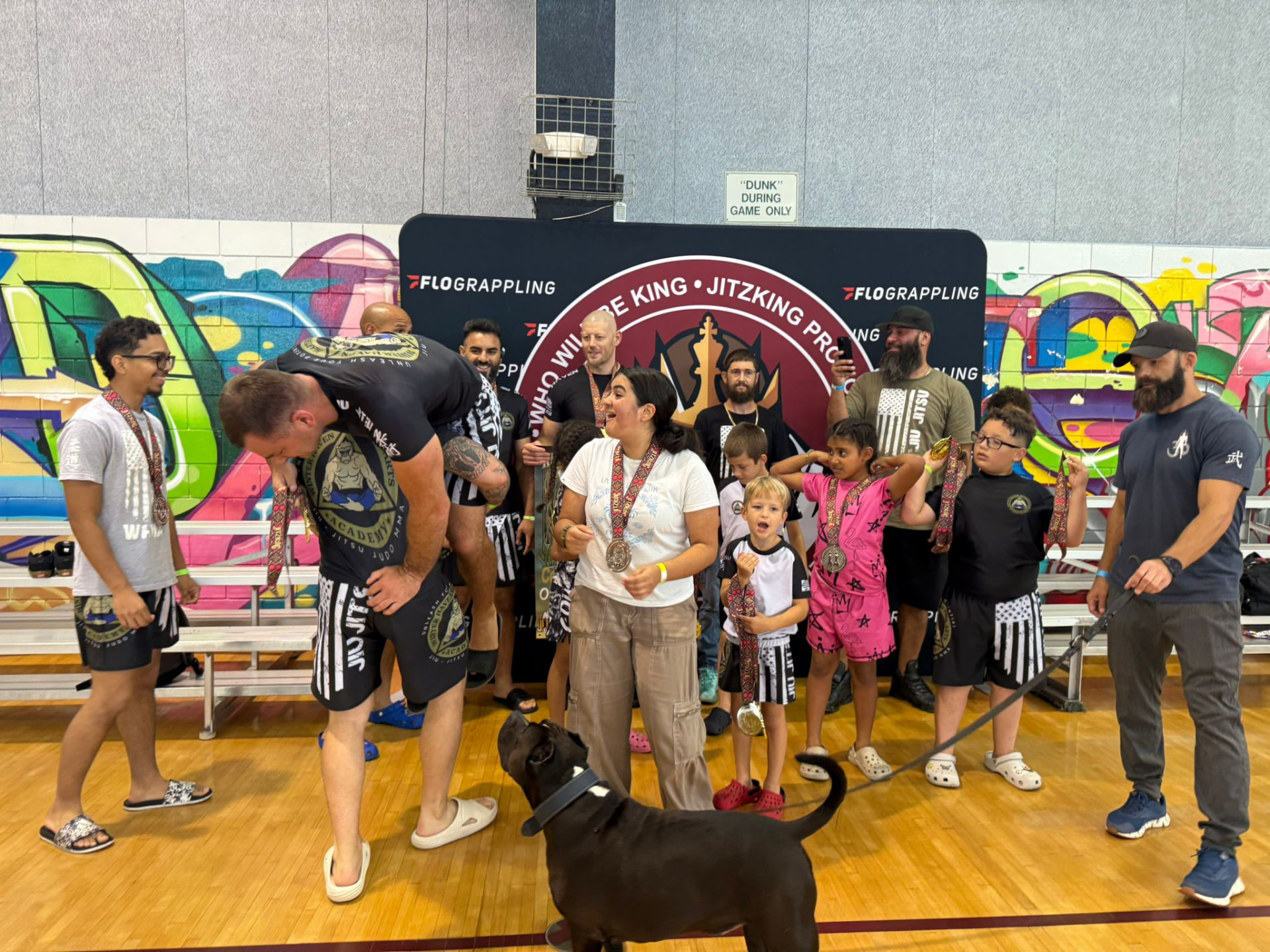 Winter Haven Martial Arts Academy students and parents celebrating together after the King of the Swamp tournament