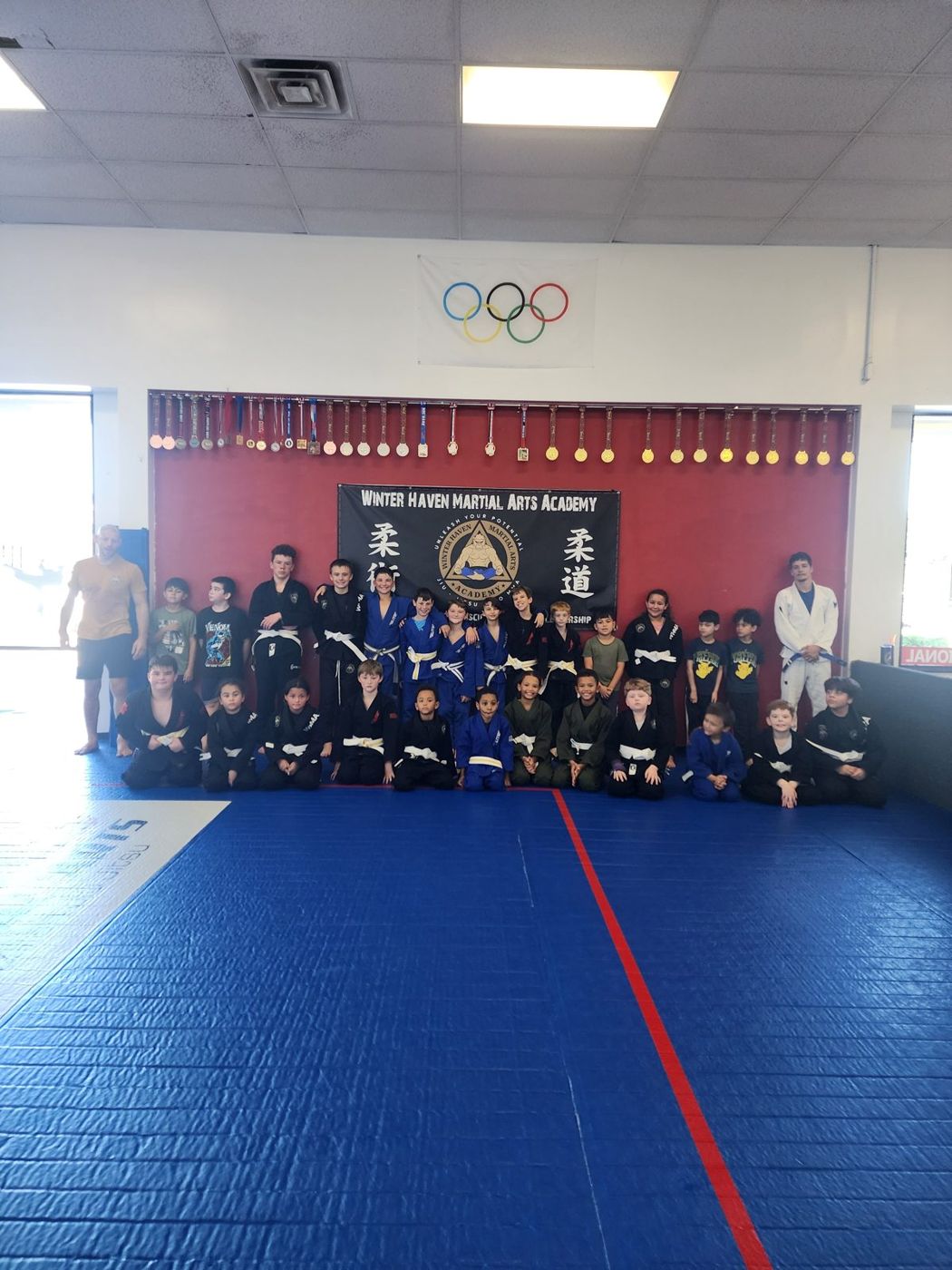 Kids gi jiu-jitsu class group photo at Winter Haven Martial Arts Academy
