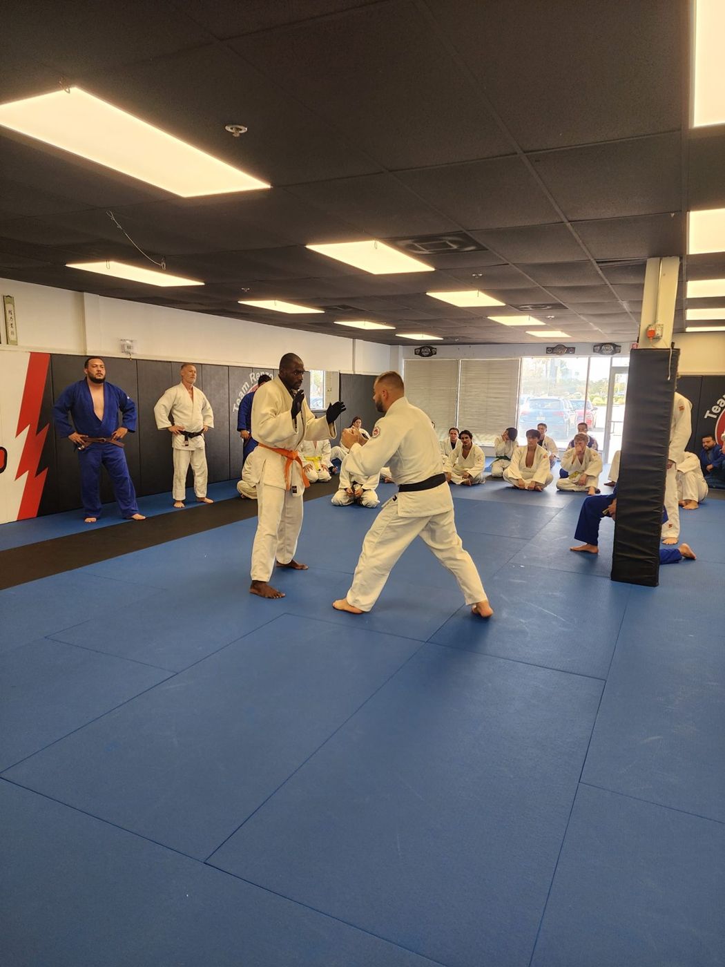 Judo throw being practiced in gis during a class in Winter Haven, FL