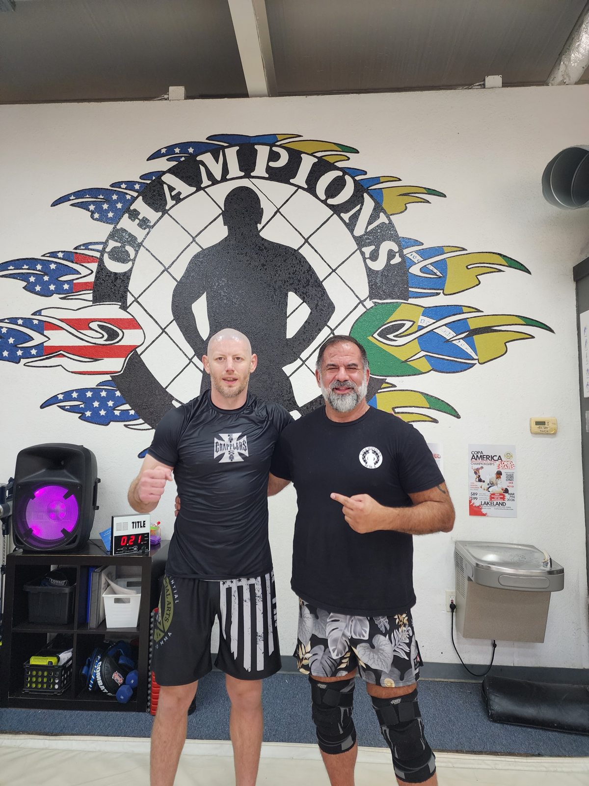 Two Winter Haven athletes training in the striking area of the gym